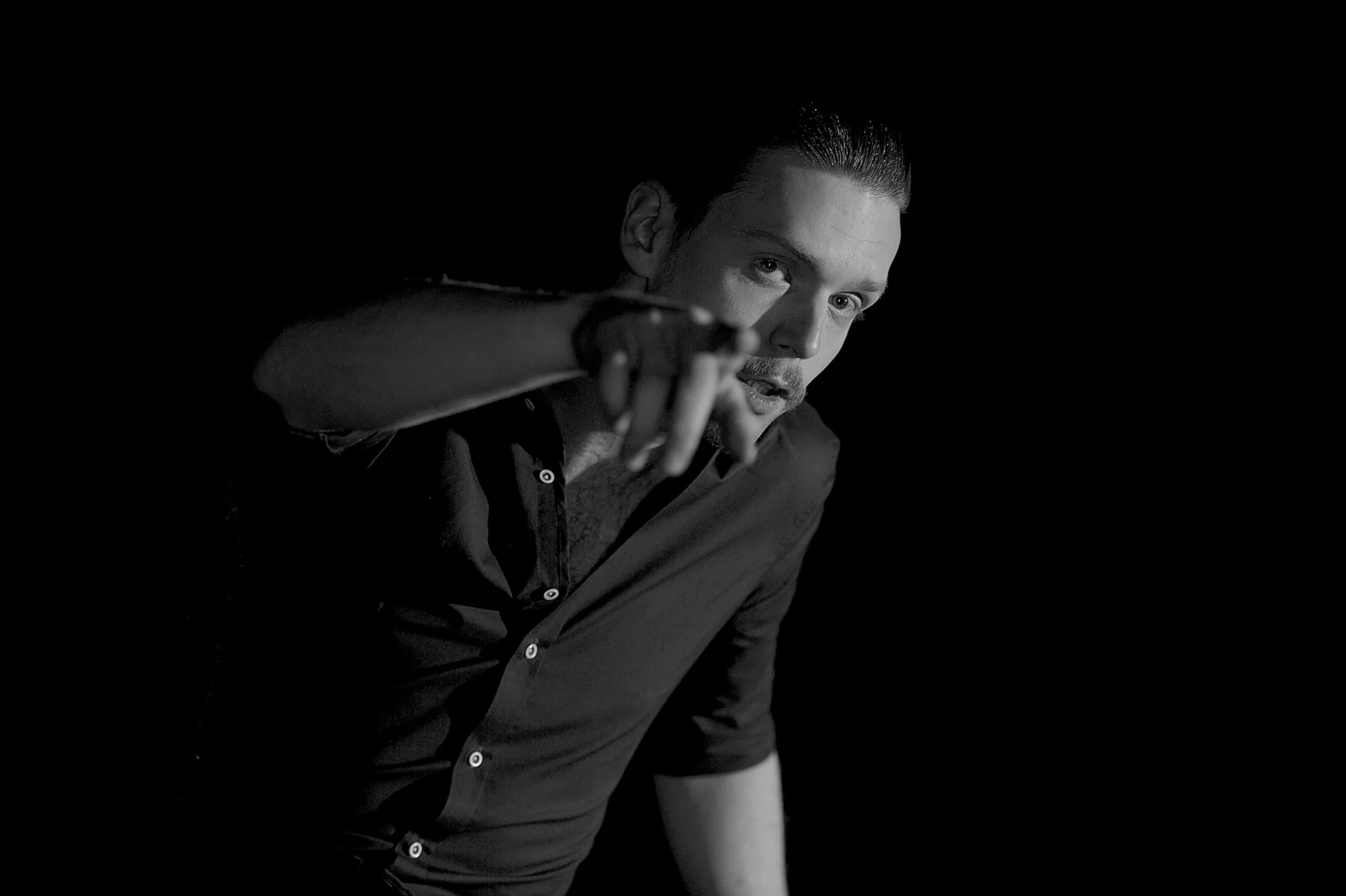 Black-and-white stage portrait of Marcus Brody